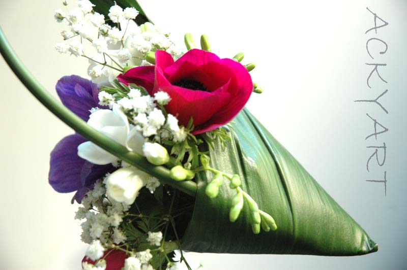 Bouquet ‘pochette’ di fiori. Il tempo di un semaforo.